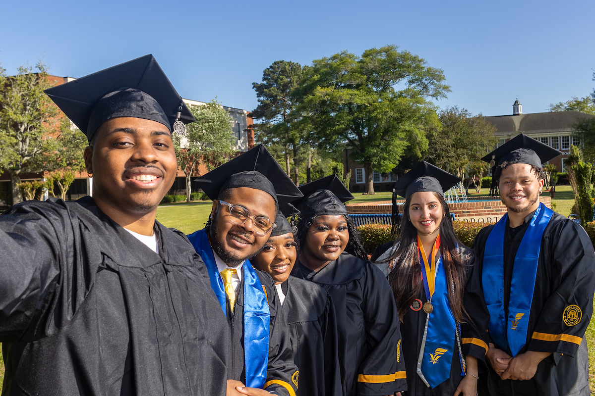 Graduates smiling