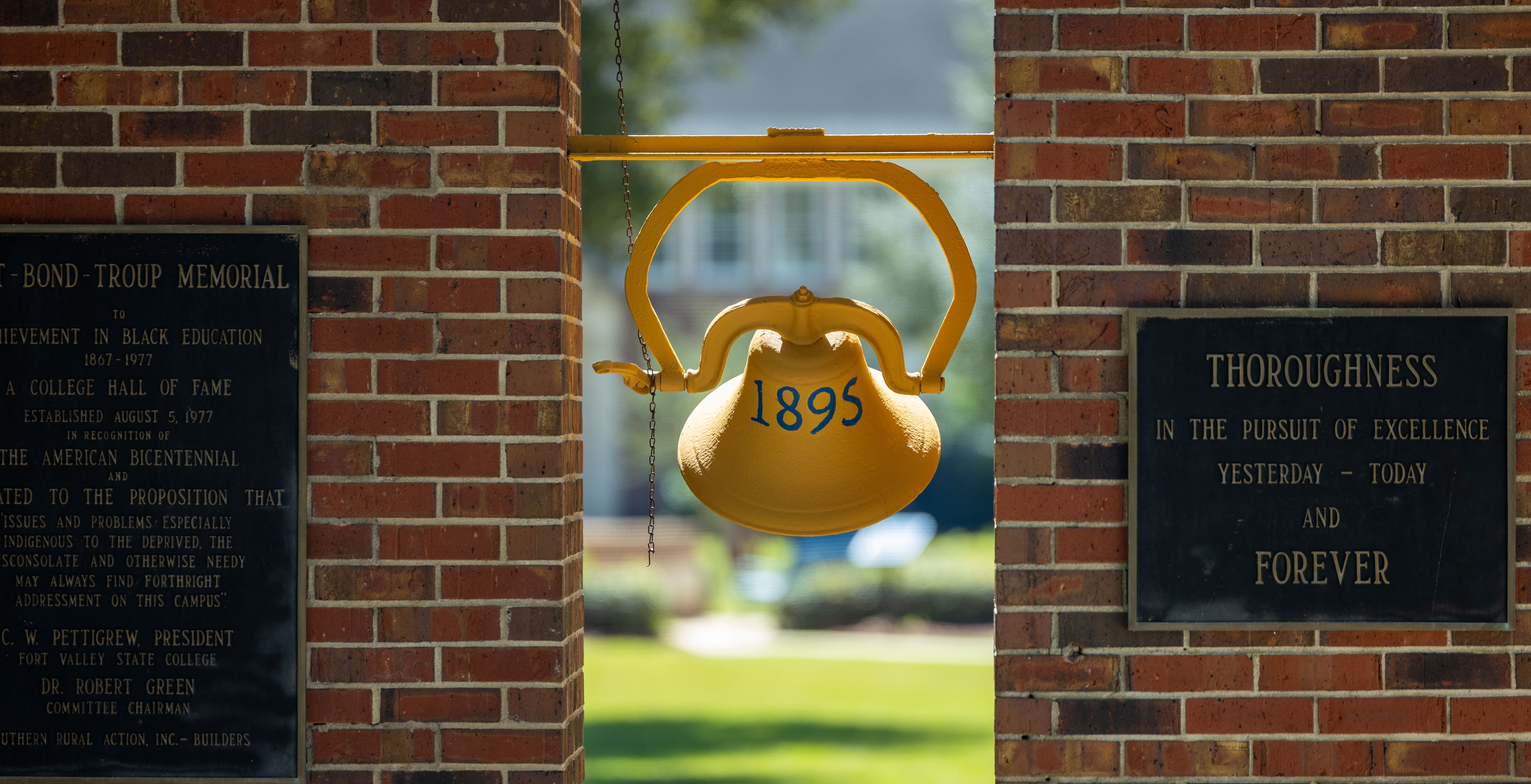 picture of bell with 1895 on it.